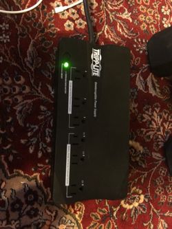 Tripplite surge protector/ charger