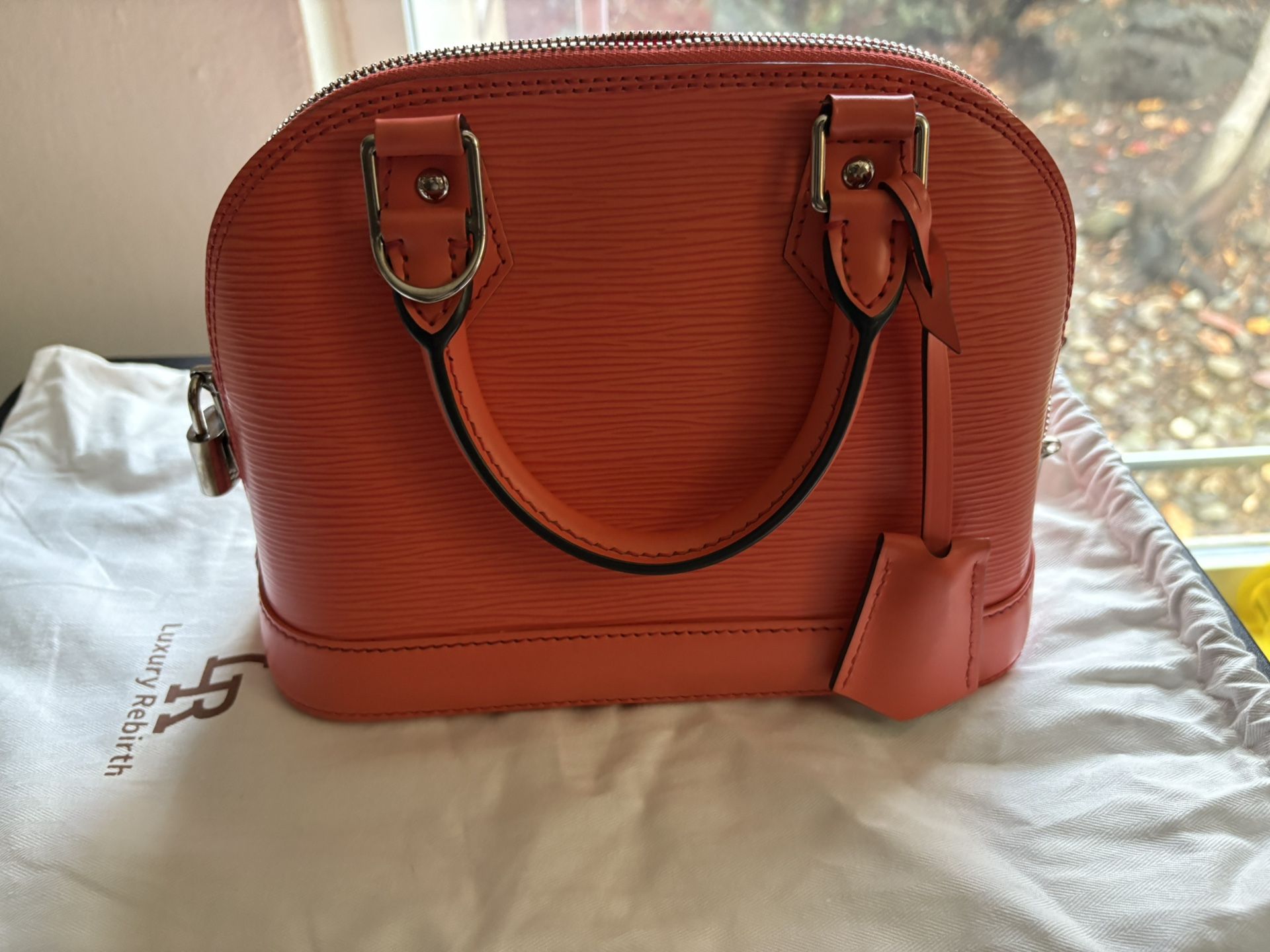 LV epi leather BB Alma