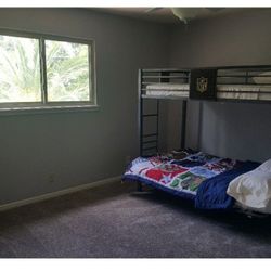 NFL bunkbed with futon at bottom