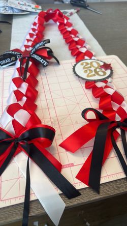 Red graduation leis