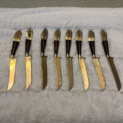 Set of eight vintage Siam Buddha brass and wood steak knives
