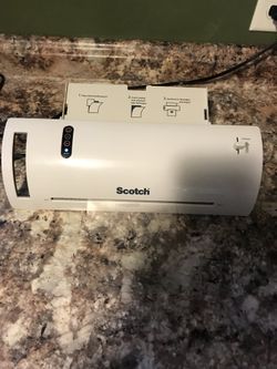 Scotch Laminator Brand New! Includes laminating pouches!