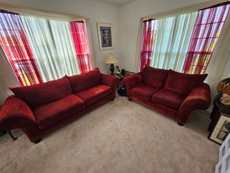 2 nice red couches