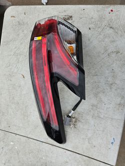 Toyota sienna left tail light oem