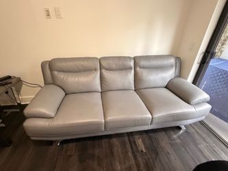 Rooms To Go Sofia Vergara Zamora Gray Leather Sofa + Modern Floor Lamp