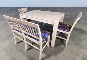 Counter height table with bench and two chairs