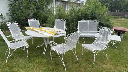 Patio Set and new Cushions. 6 chairs and table