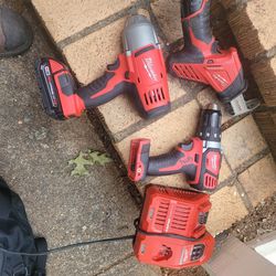 Milwaukee 1/2 Inch Impact Wrench; Drill; Sawsaw And Charger