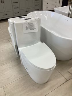 One piece  toilet white new elongated with Softclose seat tornado self clean dual flush modern design ready for pick up today