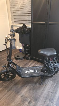 Electric sit down scooter