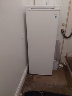 Upright defreezer
