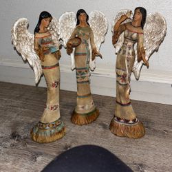 set of three Ebros Gift Native American female angel figurines holding a Bible, dove, and basket