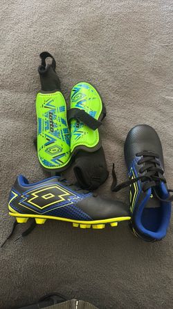 Kids size 12C soccer shoes and shin guards