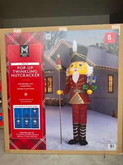 8” Pre-lit Pop Up Tinsel Twinkling Nutcracker