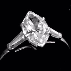 Large genuine diamond and platinum engagement ring