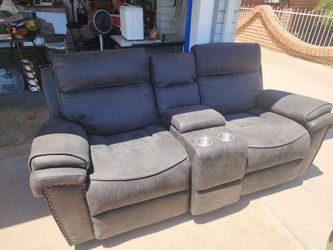Rocking reclining love seat with center console