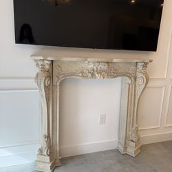 Stone fireplace mantel