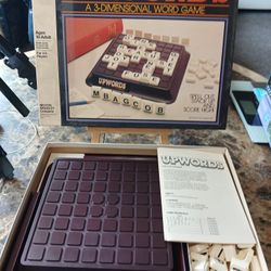 The Vintage 1983 UPWORDS Milton Bradley Board Game is a classic 3-dimensional word game that challenges players to strategize their way to high scores
