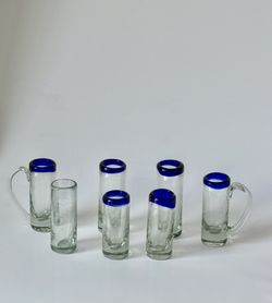 Hand Blown Mexican Tequila Shot Glasses - Set Of 7. (6x Cobalt Blue Rim, 1x Clear) - 2oz Each