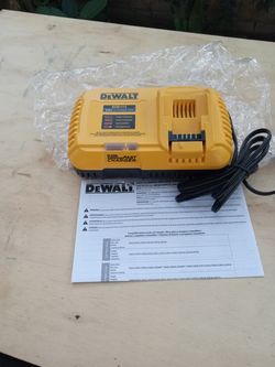 DeWalt 20v  60 v.   New.  Fast charger.  12 amp