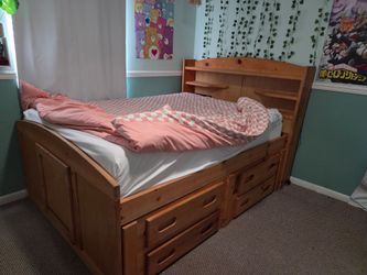Full size bed frame with drawers and hideaway storage. Mattress not included
