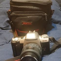 Kodak zx-50 35-80mm with 49mm skylight 1a filter multicolored with bag