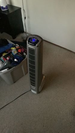 Rotating standing fan
