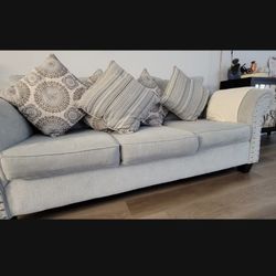 Beautiful Artisan blue couch and love seat.