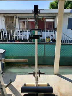 Selling home gym olympic bench press And  a multi-function cable gym machine