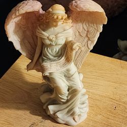 1994 Roman's Seraphim Classics Figurine Angel wisdom's Child 6 and a 1/2 inches tall Excellent condition pick up only.