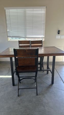 Wood dining table with 3 chairs