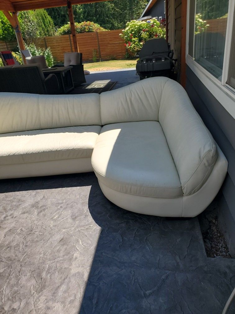 White Leather Sofa. Looks Good