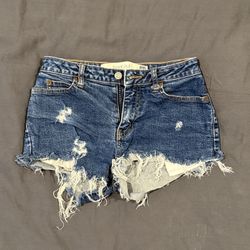 Frayed denim cutoff shorts