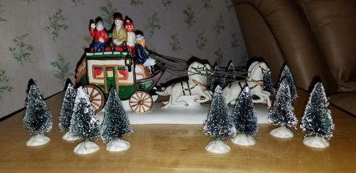 Christmas Carriage Holding Family