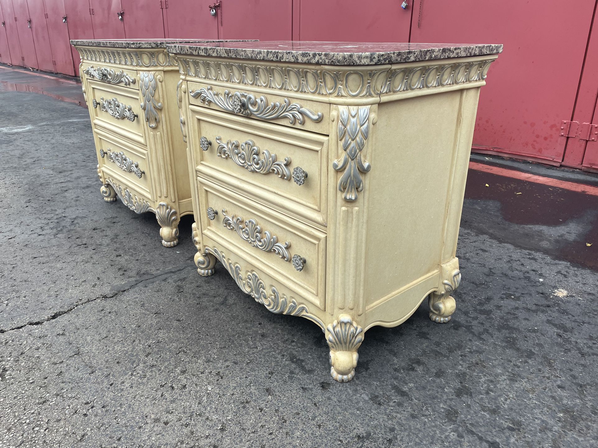 Two (2) tall large French style wood granite top two drawer with slide out tray night stands bed side end tables