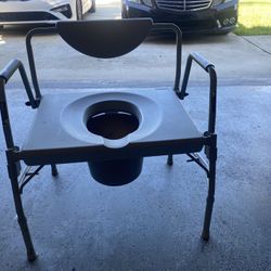 Drop Arm Commode 