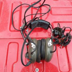 Vintage Pilot Headset And Paper Flight Computer.