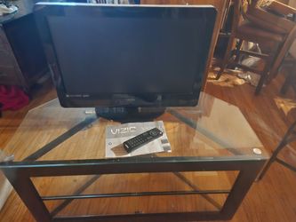 Living room furniture.  TV with glass stand