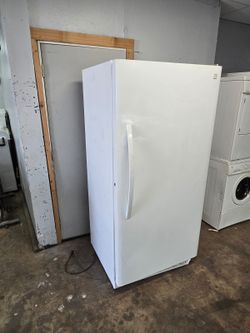 kenmore stand up commercial freezer.