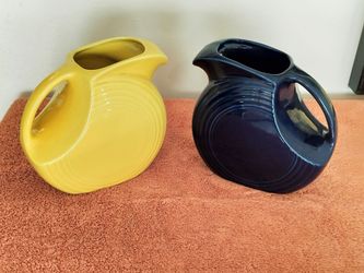 Vintage Mid Century Collectible Homer Laughlin Fiesta Large Art Deco Disc Pitchers in Cobalt Blue and Sunny Yellow.
