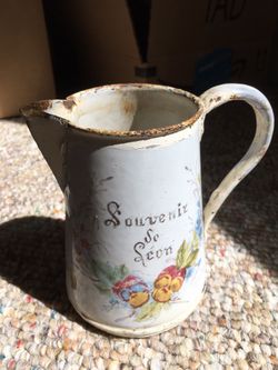 Antique metal pitcher from France