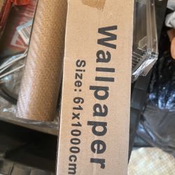 Various Rolls Of Wallpaper 