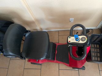 Red mobility scooter