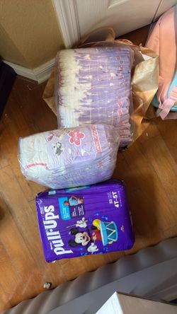 2 packs of diapers and pull ups size 4/5