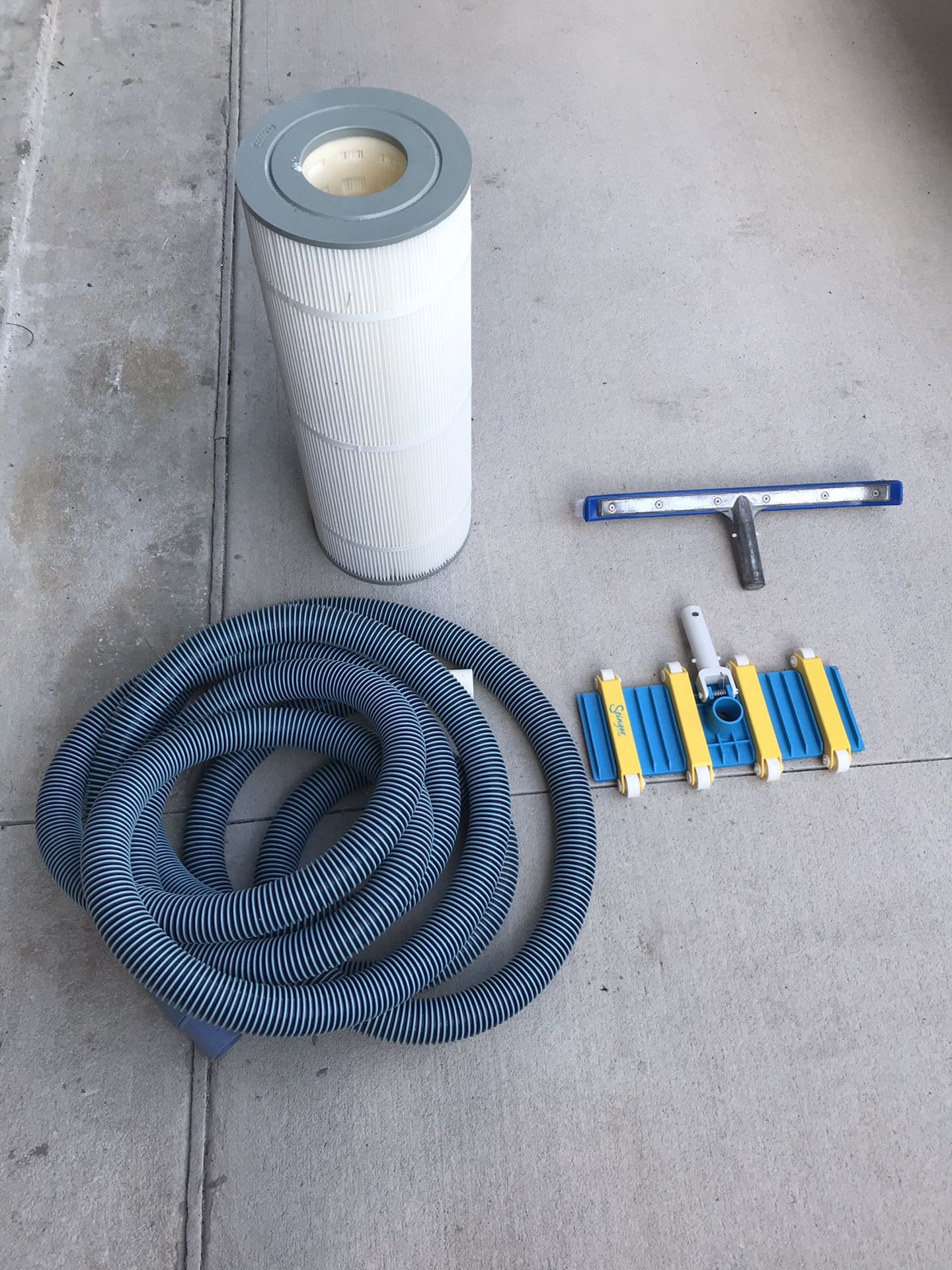 new pool filter, brush, hose and vacuum