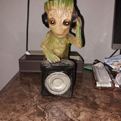 A Small Statue Of Groot