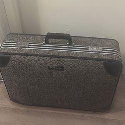 Suitcase Check In Capacity 50lb Dimensions 20”x28”