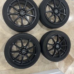 Selling Black Rims with tires  