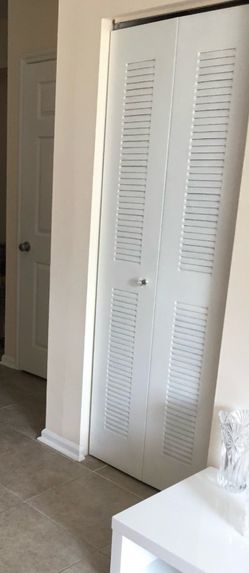 AC metal folding door 78” x 24” each panel