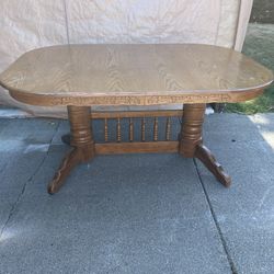 Solid wood oak dining room table with six chairs